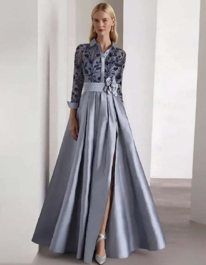Vestido elegante de satén con corpiño bordado y detalle floral en la cintura