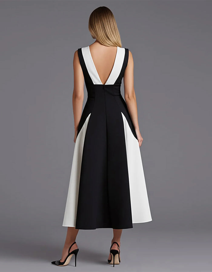 Vestido midi sin mangas en blanco y negro con escote en V