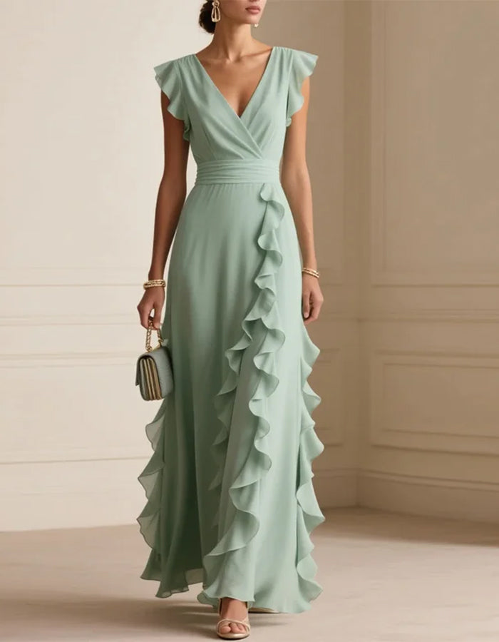 Anmutiges mintgrünes Chiffonkleid mit Rüschenärmeln und drapiertem Rock  