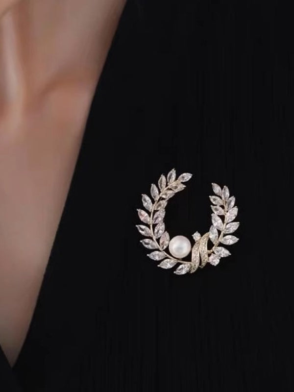 Broche de rama de olivo y perlas