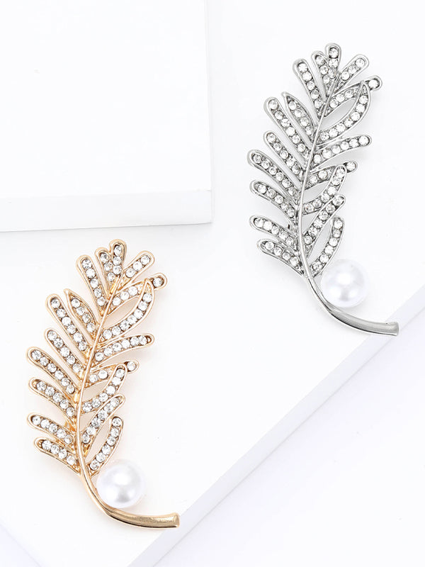 Spilla in lega con strass e piume