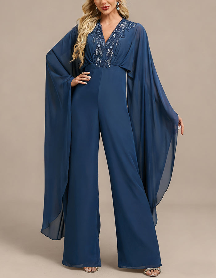 Tuta in chiffon blu con scollo a V
