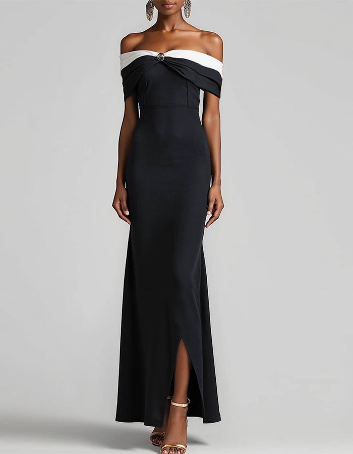 Vestido largo bicolor negro y blanco con hombros descubiertos