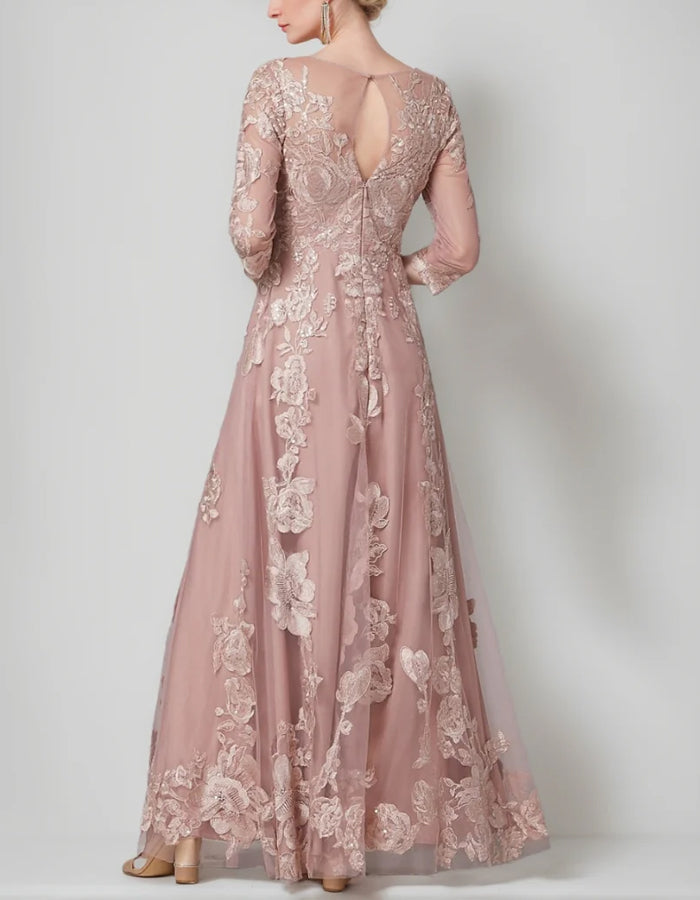 Abito lungo in pizzo e rete rosa tenue