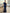Marineblauwe satijnen off-shoulder maxi-jurk met split