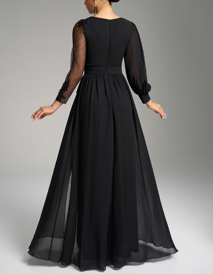 Robe longue noire en mousseline avec sequins, broderies et fente