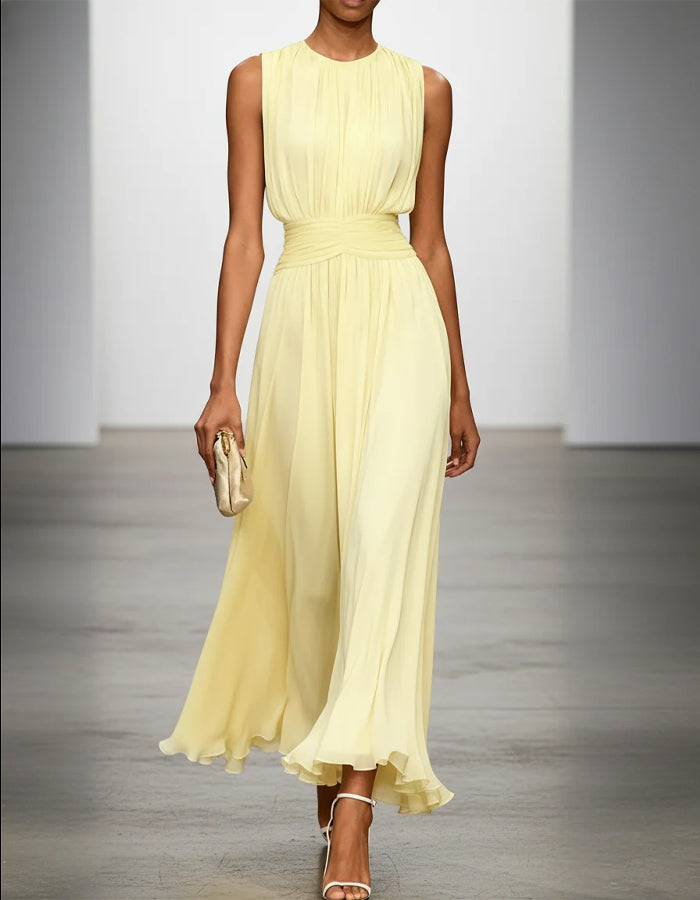 Vestido largo de gasa amarillo sin mangas con cintura ceñida