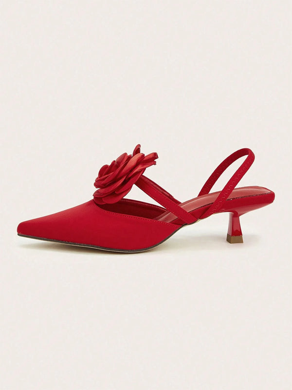 Einfarbige spitze Stiletto-Absätze mit Blumenverzierung
