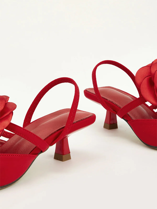 Einfarbige spitze Stiletto-Absätze mit Blumenverzierung