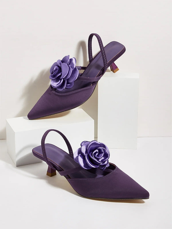Einfarbige spitze Stiletto-Absätze mit Blumenverzierung