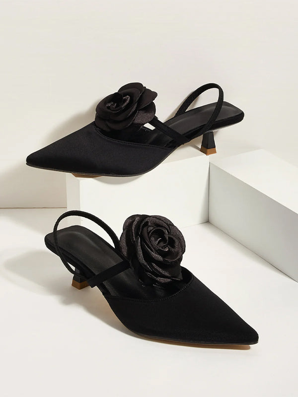 Einfarbige spitze Stiletto-Absätze mit Blumenverzierung