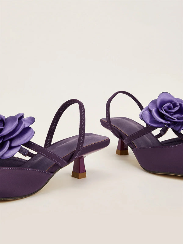 Einfarbige spitze Stiletto-Absätze mit Blumenverzierung