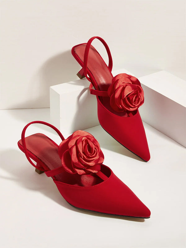 Einfarbige spitze Stiletto-Absätze mit Blumenverzierung