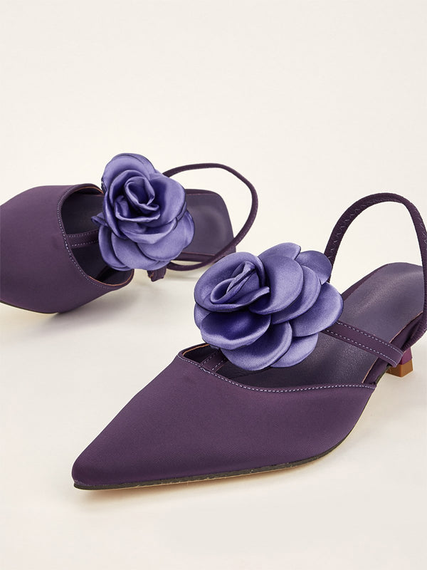 Einfarbige spitze Stiletto-Absätze mit Blumenverzierung