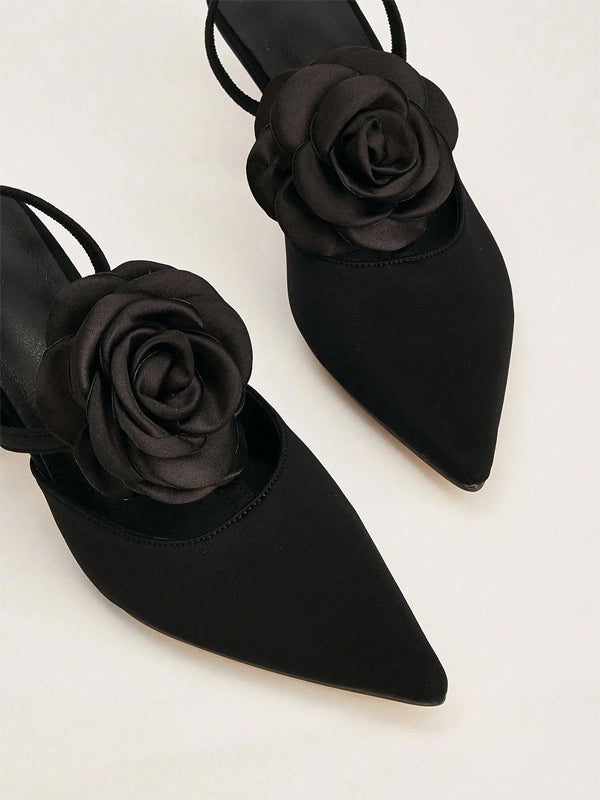 Einfarbige spitze Stiletto-Absätze mit Blumenverzierung