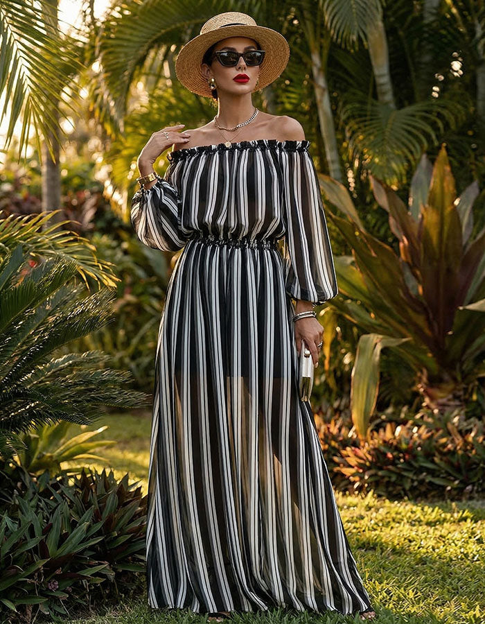 Vestido maxi preto e branco às riscas, ombros descobertos e chiffon