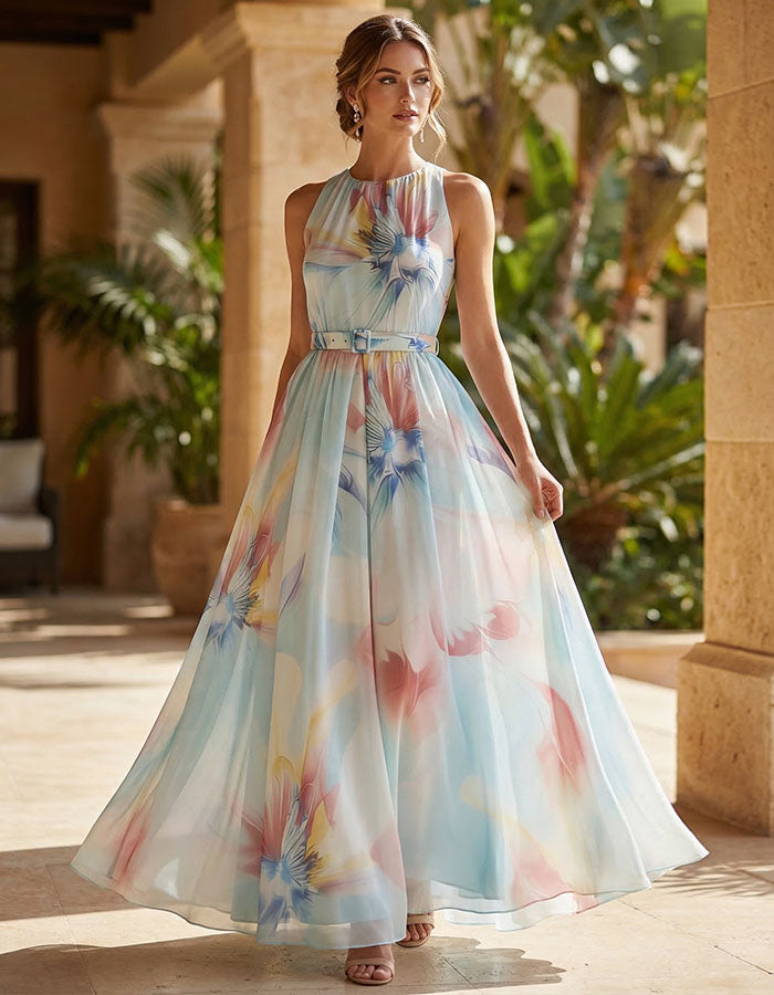 Abito lungo con sfondo blu, fiori iridescenti, collo all'americana e vita aderente