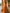 Warmes orangefarbenes Batik-Maxikleid mit V-Ausschnitt und Knoten  