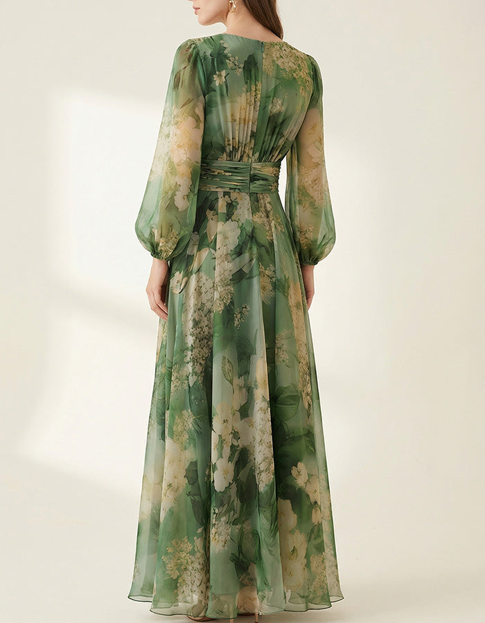 Abito lungo avvolgente in chiffon verde con stampa floreale
