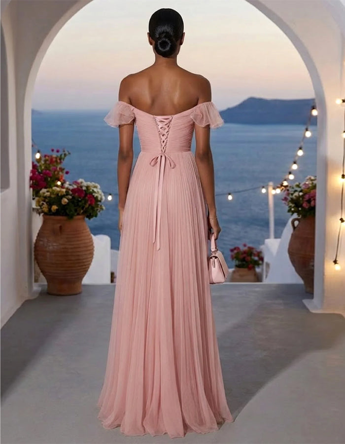 Robe longue rose en mousseline plissée à épaules dénudées avec volants  