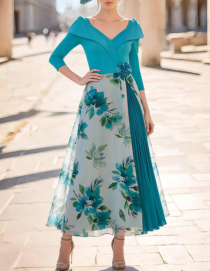 Abito midi in chiffon verde acqua con motivo floreale acquerellato
