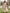 Rosa Maxikleid aus Chiffon mit floralem V-Ausschnitt und Bindeband  
