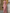 Maxikleid aus Satin mit Neckholder, tailliert und unregelmäßig plissiert