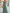 Grijs-groene tule maxi-jurk met off-shoulder, pofmouwen en getailleerde taille