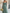 Grijs-groene tule maxi-jurk met off-shoulder, pofmouwen en getailleerde taille