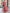 Schwarzes schulterfreies Maxikleid aus Chiffon mit Schlitz