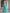 Maxikleid in Uni-Farbe mit schulterfreiem Mesh, Raffung und Schlitz