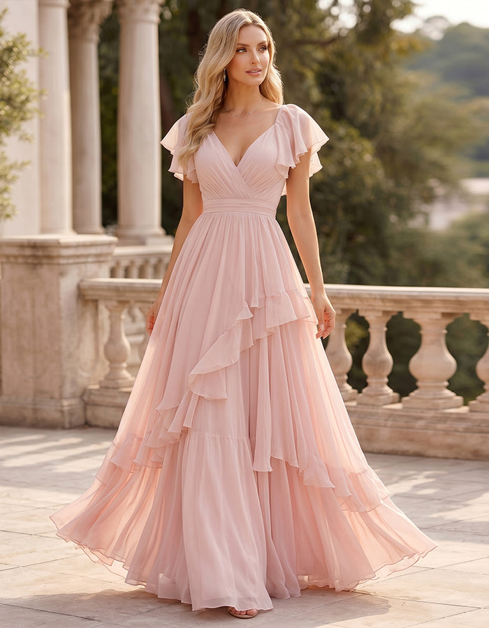 Abito lungo in chiffon rosa con scollo a V, maniche con volant e strati