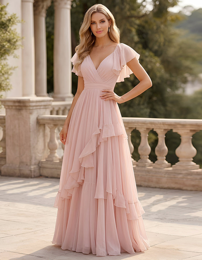 Abito lungo in chiffon rosa con scollo a V, maniche con volant e strati