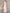Vestido midi rosa claro com um ombro só, folhos e corte alto-baixo  