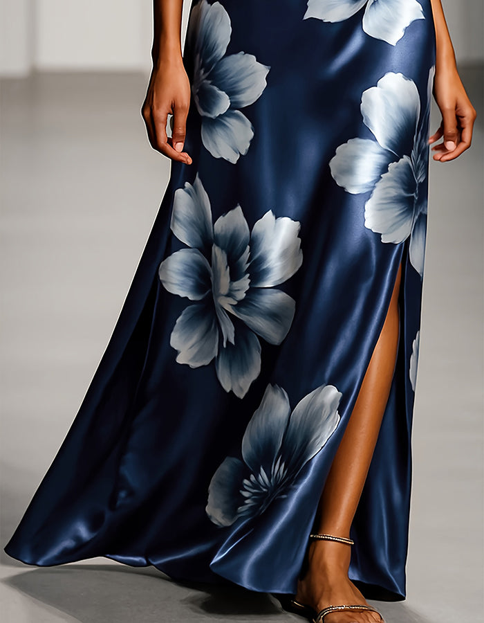 Abito lungo senza maniche in satin blu navy con grande stampa floreale