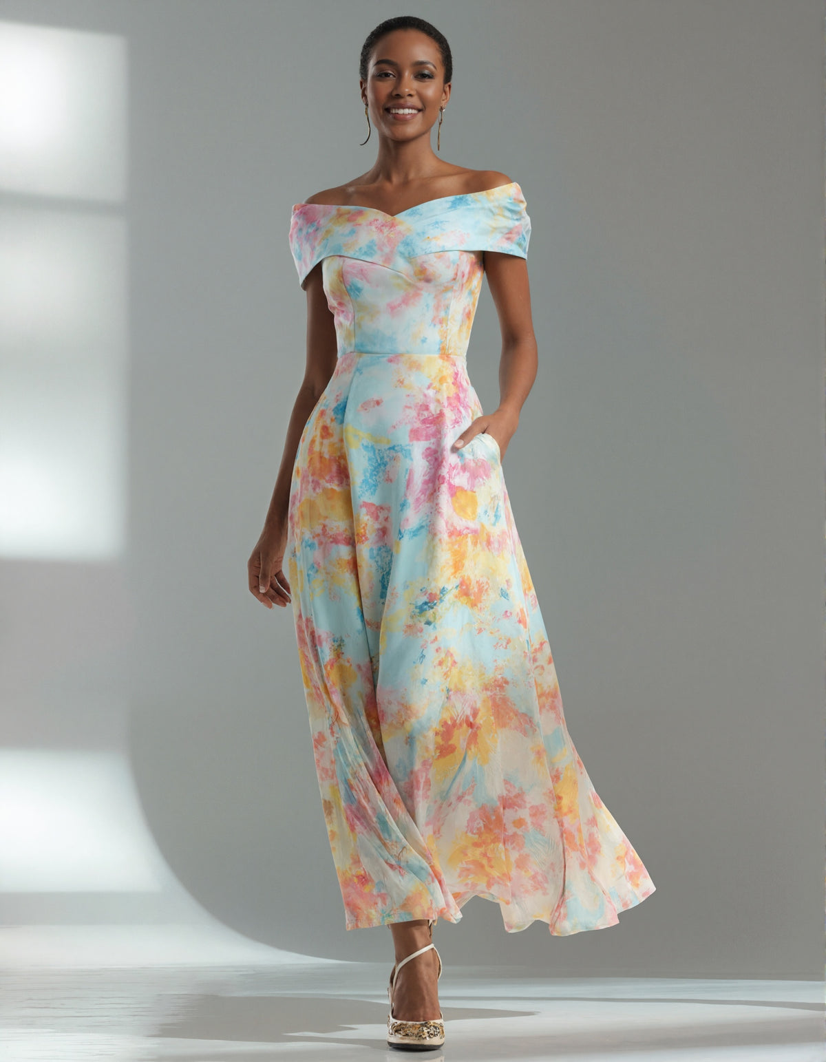 Vestido maxi con estampado en acuarela y hombros descubiertos