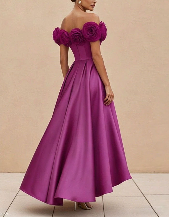 Vestido maxi rosa satinado con hombros descubiertos