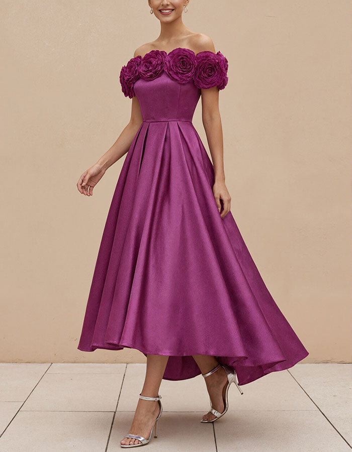 Vestido maxi rosa satinado con hombros descubiertos