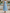 Light Blue Sleeveless Ruched Tulle with 3D Floral Appliqués Midi Dress