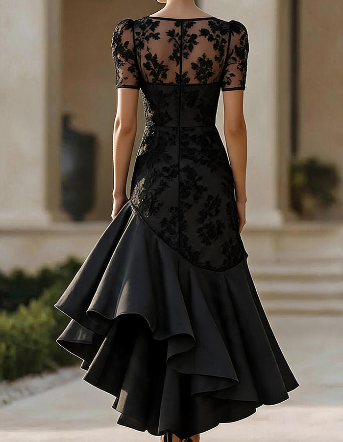 Robe midi noire en dentelle florale avec col illusion et ourlet asymétrique