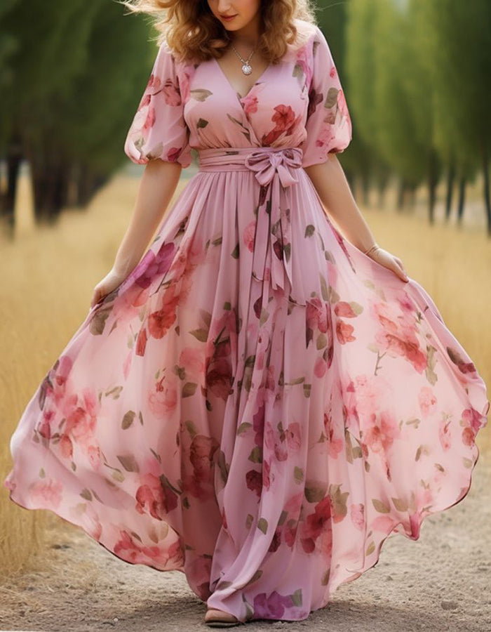 Vestido maxi rosa de chiffon com padrão floral e estilo envelope