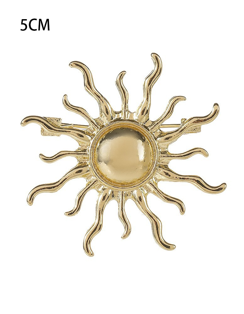 Spilla a forma di girasole in lega d'oro