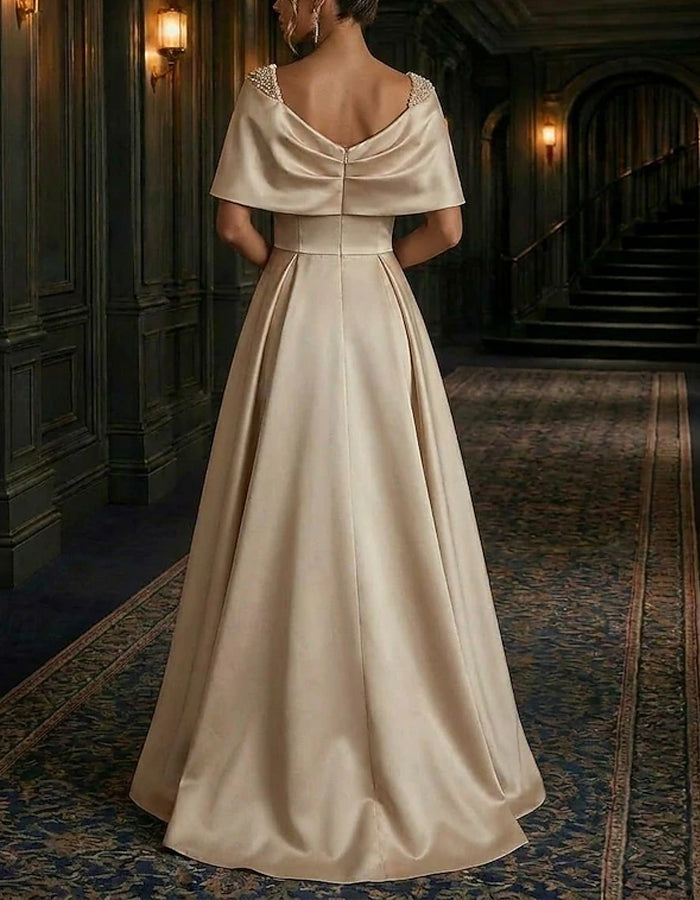 Abito lungo in raso color champagne