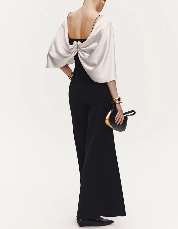 Tweekleurige zwart-witte satijnen strik cape stretch flare broek jumpsuit