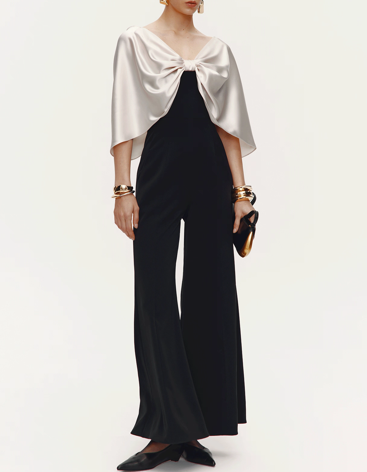 Tweekleurige zwart-witte satijnen strik cape stretch flare broek jumpsuit
