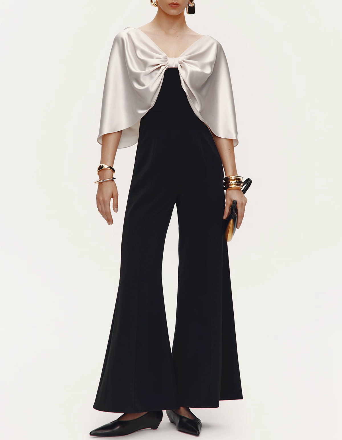 Tweekleurige zwart-witte satijnen strik cape stretch flare broek jumpsuit