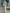 Weißes Maxikleid mit floraler Spitze, Rundhalsausschnitt, Fledermausärmeln und ausgestellten Falten
