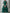 Rochie midi din organza verde smarald, cu mâneci tip pelerină transparente și volane în mai multe straturi  