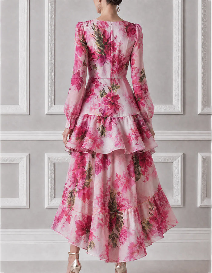 Abito midi rosa in chiffon con scollo a V incrociato, maniche a sbuffo e volant multipli