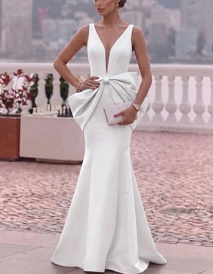 Vestido maxi de satén mate con escote en V profundo, lazo grande y fajín